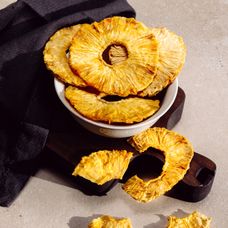 Dried pineapple rings in a bowl